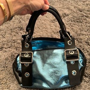 Plinio Visona Genuine leather Italia 1969 bowling style bag with 4 zip pockets.